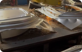 Stamped steel engine hoods ready for quality inspection